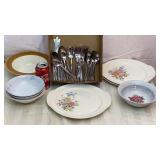 Silverware, plates and bowls