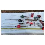 Ice fishing poles x 4 and supplies