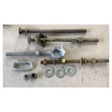 Bucket full of washers, nuts, carriage bolts, eye