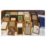 Assorted 5X7 picture frames and photo album