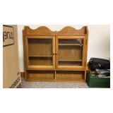 Shelf with glass doors