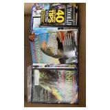 Box full of hunting and fishing magazines