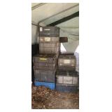 Big stack of plastic totes.