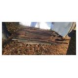 Pile of steel fence post.