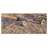 Old home-made farm wagon running gears.