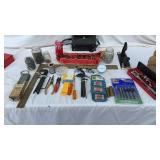 Tools, nails, level, sharpening stone, etc