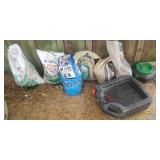 One and a 1/2 bags of lawn fertilizer pea gravel