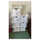 White storage unit with white rope cube baskets,