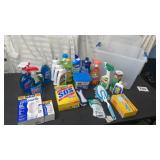 Tote full cleaning supplies,  Pur water