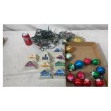 Christmas lights, bulbs, plastic ornaments