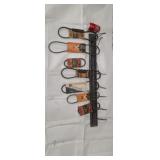 Old store stock Gates V belt holder with belts.