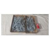 Large group of pegboard hooks assortment.
