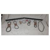 Old store stock Gates V belt holders and belts.