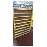 Wood shelf unit 65" tall 49" 3.5" deep.
