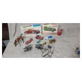 2 empty model car boxes and other toys