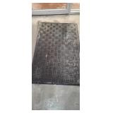 54" X 33" rubber door mat.