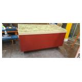 Store display on rollers with bottom storage 64"