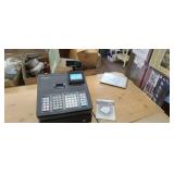 Chalk. XE-A23S cash register used every day.