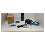 Minolta X-700 35mm camera with Tele-Macro lens.