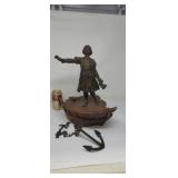 Bronze statue of Christopher Columbus standing on