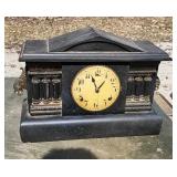 Old mantel clock in rough shape.