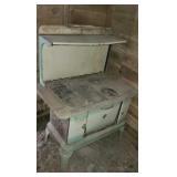 Old porcelain wood cook stove rough shape