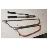 Two pruning saws & a tree lopper