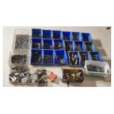 Hardware and plastic storage trays.