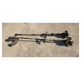 Two John Deere gas weedeater one runs the other