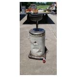 Old filling station oil drain barrel