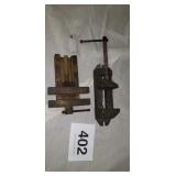 Two drill press vices