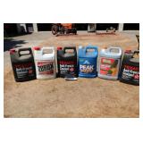6 JUGS OF ANTI FREEZE