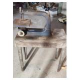 Older scroll saw no motor.