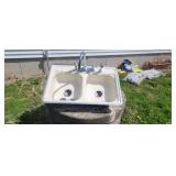 Cast-iron  kitchen sink couple small chips good