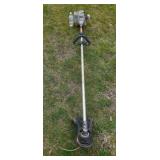 Echo SRM-210 gas weed eater, with Operator