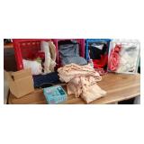 Remnants of fabric in plastic crates included