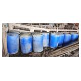 11  plastic  drums 55 gal with lids.