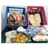 Remnants of fabric with plastic storage crates