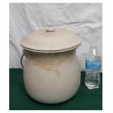 Vintage crock with handle and lid, has been