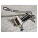 Commercial French fry cutter.