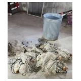 Fishing net with  garbage can to keep it in.