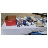 Tote full of paint supplies