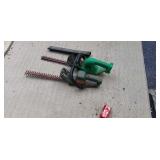 Two hedge trimmers