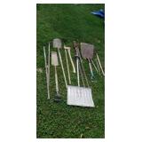 Shovels rakes Ax  post hole digger.