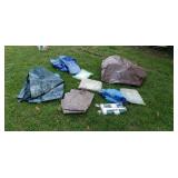 Tarps and rolls of plastic