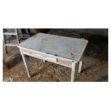Old porcelain top kitchen table with drawer.