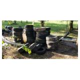 Stack of used tires 15 and 16" some with rims