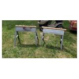Two metal folding saw horses
