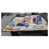 Placemats dishes creamer and sugar.