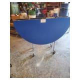 FOLDING ROUND TABLE ON CASTERS